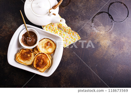 Pancakes with chocolate paste , on a white plate 118673569