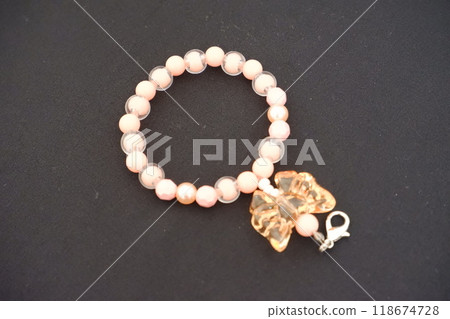 pearls necklace on the black background 118674728