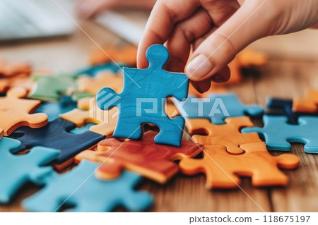 Ai generated Child hand holding colorful heart on blue background. World autism awareness day  118675197