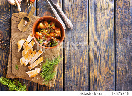 chicken fillet on board with vegetable stew in bowl 118675846