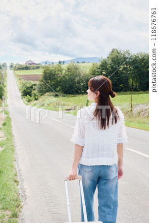 Woman traveling alone 118676761