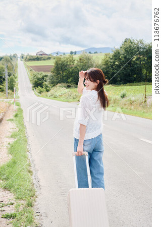 Woman traveling alone Woman traveling alone 118676762