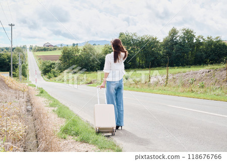 Woman traveling alone Woman traveling alone 118676766