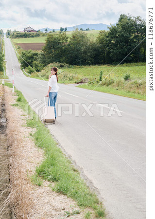 Woman traveling alone Woman traveling alone 118676771