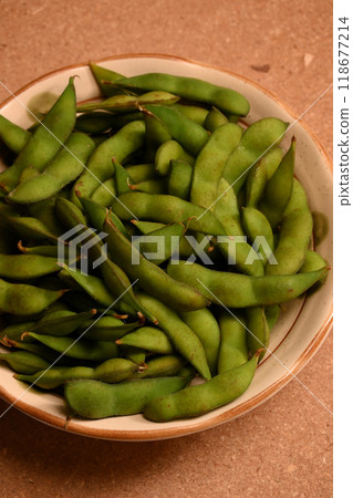 Heaps of green soybeans 118677214