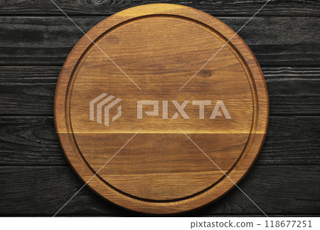 empty round wooden pizza board empty round wooden pizza board 118677251