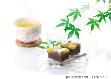 Yokan (steamed chestnut yokan) served on a glass plate on a white background Yokan (steamed chestnut yokan) served on a glass plate on a white background 118677580
