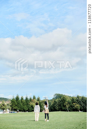 Women relaxing in nature 118677720