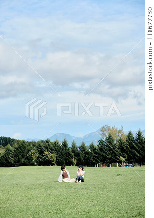Women relaxing in nature Women relaxing in nature 118677730