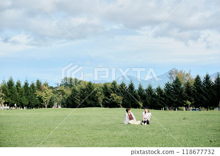 Women relaxing in nature Women relaxing in nature 118677732