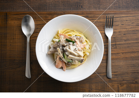 Salmon and mushrooms cream pasta 118677782