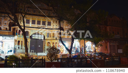 Jaipur, Rajasthan, India. Auto Rickshaw Or Tuk-tuk, Motorcycles Drive By Street. Traffic In City Street. Night City Life. Old Architecture Of Jaipur 118678940