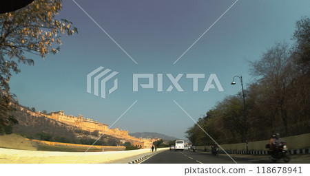 Jaipur, Rajasthan, India. Amer Fort Or Amber Fort, Amer, Rajasthan, India. Amer Palace Is Great Example Of Rajput Architecture. Amber Fort Principal Tourist Attraction In Jaipur. POV inside car. Jaipur, Rajasthan, India. Amer Fort Or Amber Fort, Amer, Rajasthan, India. Amer Palace Is Great Example Of Rajput Architecture. Amber Fort Principal Tourist Attraction In Jaipur. POV inside car. 118678941