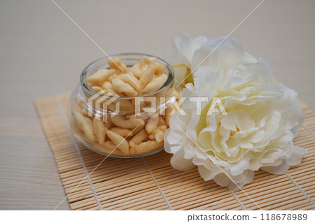 telur gabus sticks in a jar on wooden table telur gabus sticks in a jar on wooden table 118678989