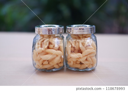 telur gabus sticks in a jar on wooden table telur gabus sticks in a jar on wooden table 118678993