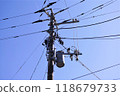electric wire attached to a pole 118679733