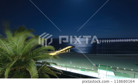 Beach of Sesimbra with pier and palm at night, Portugal timelapse Beach of Sesimbra with pier and palm at night, Portugal timelapse 118680164