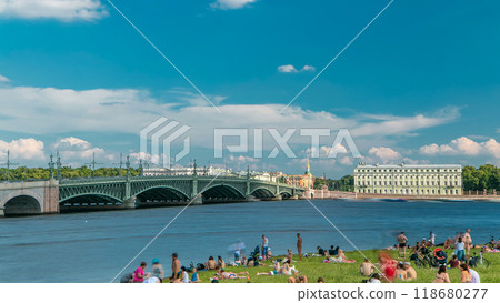 View of the Trinity Bridge and beach near Peter and Paul Fortress across the Neva river timelapse, St. Petersburg, Russia 118680277