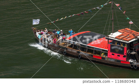Passengers in a cruise on the Douro river in Tourist boat in Porto, Portugal timelapse Passengers in a cruise on the Douro river in Tourist boat in Porto, Portugal timelapse 118680348