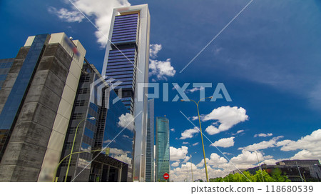 Skyscrapers timelapse hyperlapse in the Four Towers Business Area with the tallest skyscrapers in Madrid and Spain 118680539