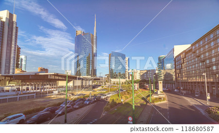 Milan skyline with modern skyscrapers in Porta Nuova business district timelapse hyperlapse in Milan, Italy, at sunset. 118680587