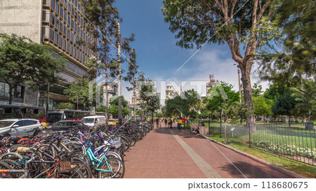 Red cycling track in the Jose Larco avenue and bicycle parking timelapse hyperlapse in Miraflores, Lima Peru Red cycling track in the Jose Larco avenue and bicycle parking timelapse hyperlapse in Miraflores, Lima Peru 118680675