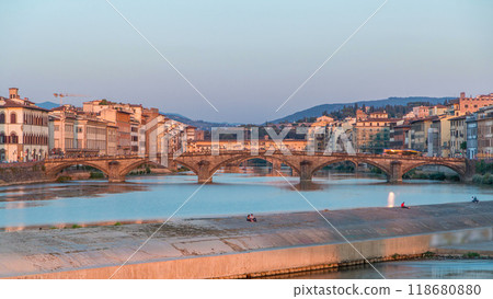 Sunset skyline timelapse view of Tuscany City, Housing, Buildings and Ponte alla Carraia and Arno River, Florence, Italy. Sunset skyline timelapse view of Tuscany City, Housing, Buildings and Ponte alla Carraia and Arno River, Florence, Italy. 118680880