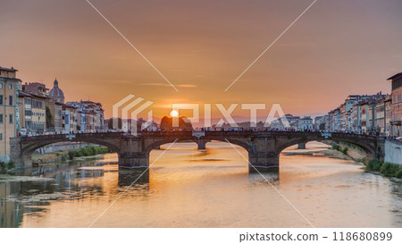 Cityscape view on Arno river with famous Holy Trinity bridge timelapse on the sunset in Florence Cityscape view on Arno river with famous Holy Trinity bridge timelapse on the sunset in Florence 118680899