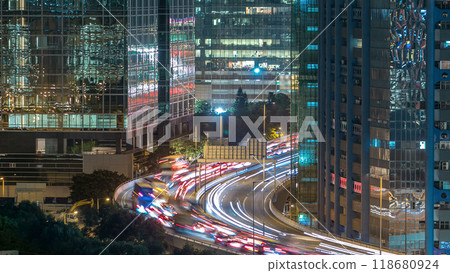 Top view of busy traffic night in finance urban timelapse, hong kong city Top view of busy traffic night in finance urban timelapse, hong kong city 118680924