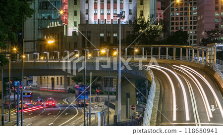 Hong Kong Business District with busy traffic timelapse at night. Hong Kong Business District with busy traffic timelapse at night. 118680941