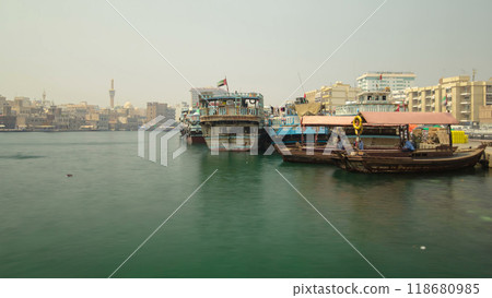 Boats at Port Saeed along Deira's shore of Dubai Creek, UAE. Timelapse 118680985