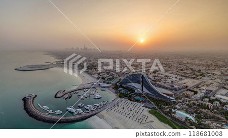 Sunrise. Aerial View of kite beach from helipad, Dubai, UAE timelapse 118681008
