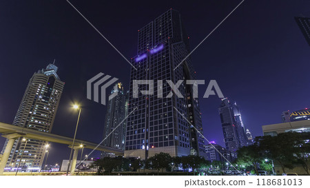 Skyscrapers at the Sheikh Zayed Road night in Dubai timelapse hyperlapse 118681013