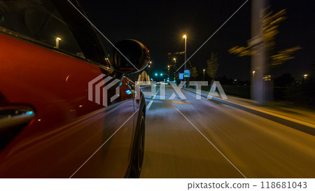 Car moves at fast speed at the night streets timelapse hyperlapse drivelapse. 118681043