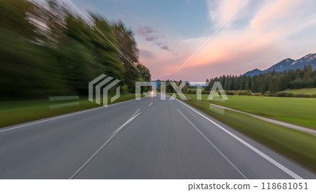 Asphalt road in Austria, Alps in a beautiful autumn day timelapse hyperlapse drivelapse 118681051