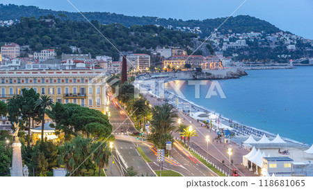 Evening aerial panorama of Nice day to night timelapse, France. Lighted Old Town little streets and waterfront after sunset 118681065