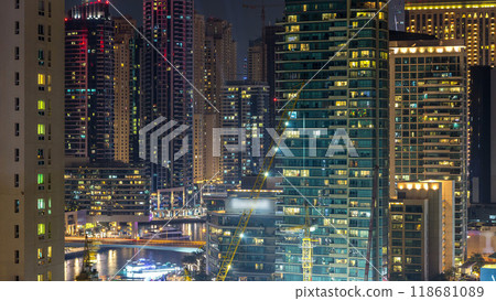 Aerial view of Dubai Marina from a vantage point night timelapse. Aerial view of Dubai Marina from a vantage point night timelapse. 118681089