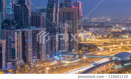 Dubai Marina skyscrapers aerial top view before sunrise from JLT in Dubai night to day timelapse, UAE. Dubai Marina skyscrapers aerial top view before sunrise from JLT in Dubai night to day timelapse, UAE. 118681110