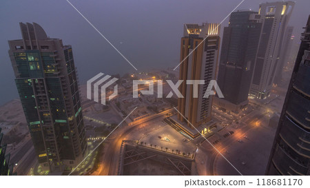 The skyline of the West Bay area from top in Doha day to night timelapse, Qatar. The skyline of the West Bay area from top in Doha day to night timelapse, Qatar. 118681170