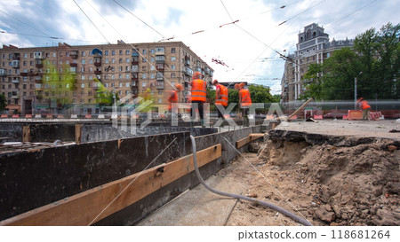 Road construction site with tram tracks repair and maintenance timelapse hyperlapse. 118681264