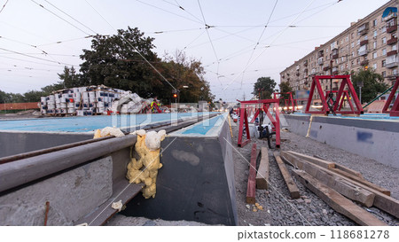 Road construction site with tram tracks repair and maintenance timelapse hyperlapse. Road construction site with tram tracks repair and maintenance timelapse hyperlapse. 118681278