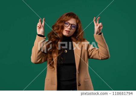 Sarcastic BusinessWoman. hands two fingers air quotes gesture on green, sarcasm Sarcastic BusinessWoman. hands two fingers air quotes gesture on green, sarcasm 118681794