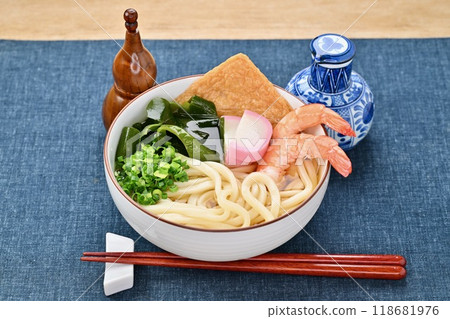 Cold udon noodles, cold udon noodles in soup, shrimp, fried tofu, kamaboko, seaweed, and green onions. Cold udon noodles, cold udon noodles in soup, shrimp, fried tofu, kamaboko, seaweed, and green onions. 118681976