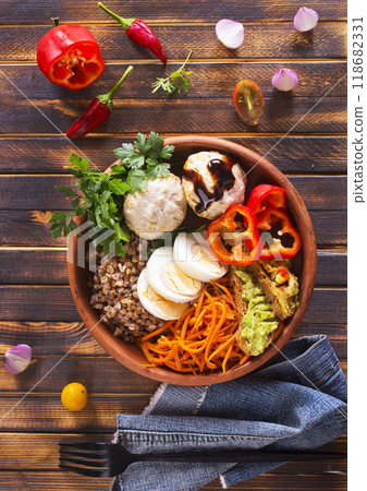 backwheat and milk in glass on a table backwheat and milk in glass on a table 118682331