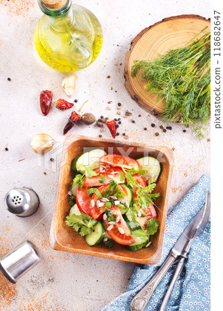Vegetable salad in wooden bowl 118682647
