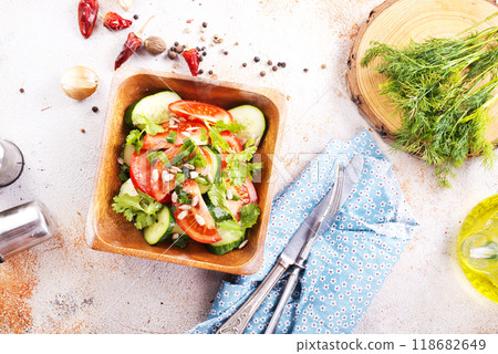 Vegetable salad in wooden bowl Vegetable salad in wooden bowl 118682649