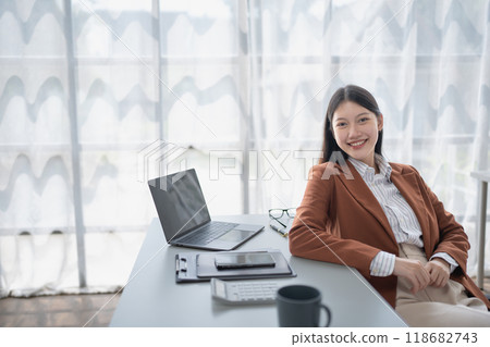 woman happiness plans for financial success by integrating budget and marketing strategies to optimize overall finance management 118682743