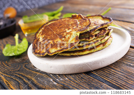 Spinach pancakes with fresh herbs 118683145