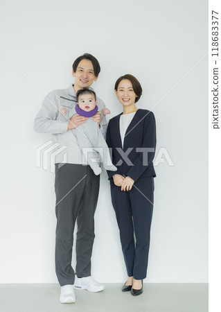 Working couple and baby 118683377