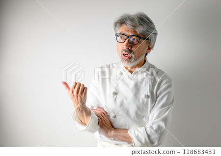 A chef who is strict about the taste of his food A chef who is strict about the taste of his food 118683431